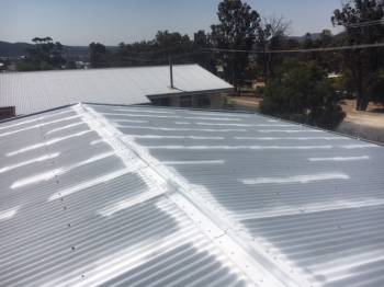 Iron Roof Restoration -rust treated & primed