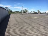 Pressure clean industrial roof