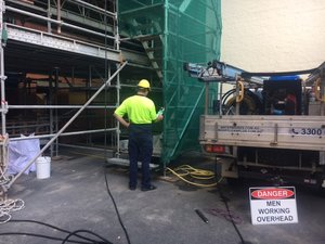 pressure cleaning off scaffold